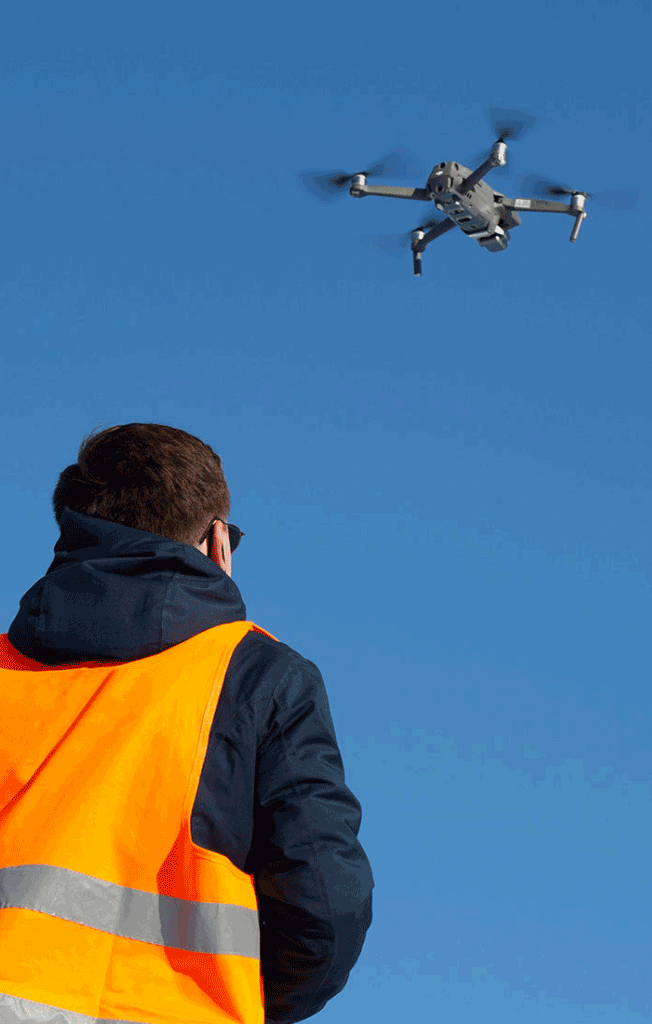 Man Flying a Drone