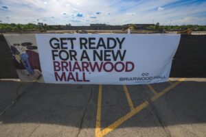 BRIARWOOD MALL: THE PLANNED PROJECT AT BRIARWOOD TRANSFORM A FORMER 166,000-SQUARE-FOOT SEARS STORE, DEMOLISHING IT AND REPLACING IT WITH NEW RETAIL AND RESIDENTIAL SPACES. SIMON PROPERTY GROUP AND HINES GLOBAL REAL ESTATE GROUP PLAN TO ADD SIDEWALKS TO GIVE THE AREA A VILLAGE FEEL.